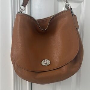 Coach Brown Hobo Bag with Leather Material and Silver Hardware